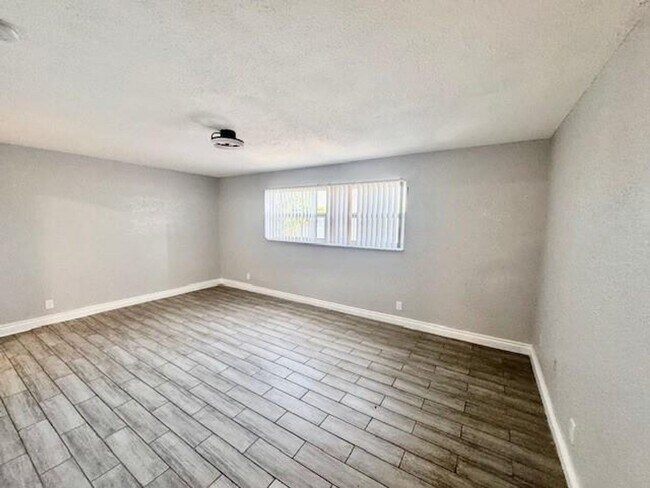 Building Photo - 5881 NW 16th Pl