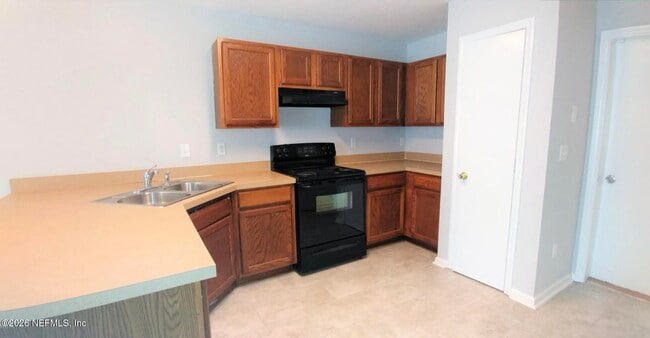 Building Photo - 7843 Playschool Ln