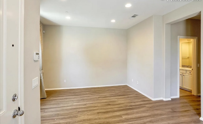Building Photo - This gorgeous 3-bedroom, 3.5 bath townhome...