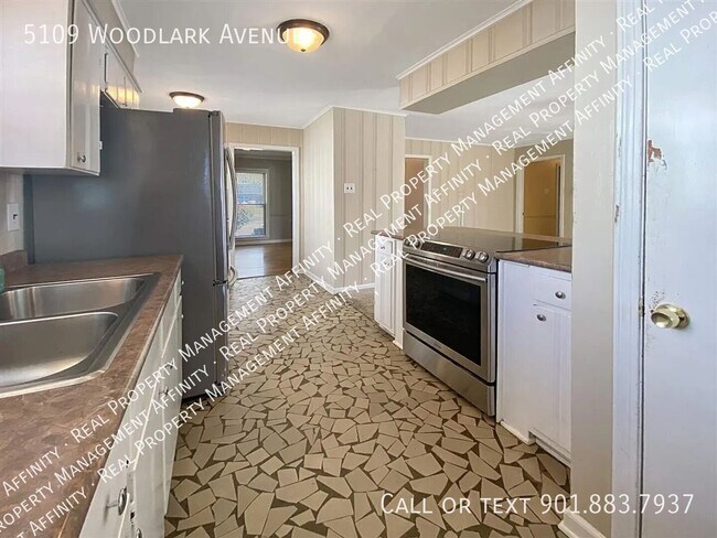 Building Photo - 5109 Woodlark Ave