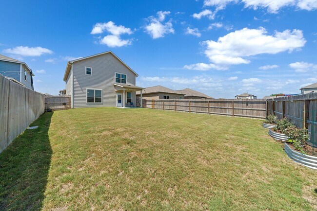 Building Photo - Stylish 4-Bedroom Home with Solar & Game R...