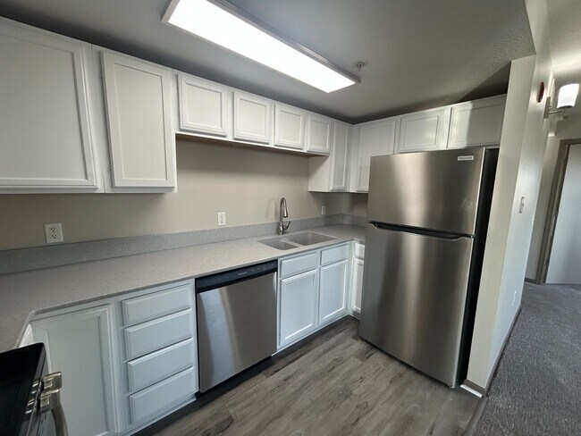 Primary Photo - Solid surface countertops, stainless steel...
