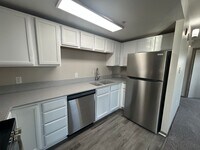 Building Photo - Solid surface countertops, stainless steel...