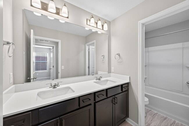 Building Photo - Anoka Detached Townhome