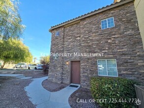 Building Photo - OPEN AND INVITING 3/BED 3/BATH TOWNHOME IN...