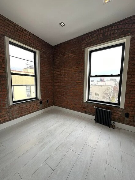 Building Photo - 111 E 119th St