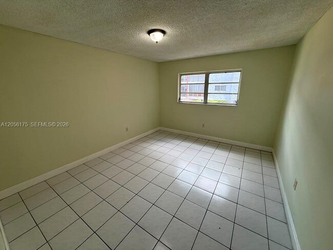 Building Photo - 6070 W 19th Ave