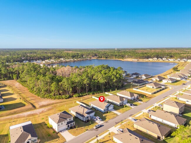 Building Photo - Never Lived in 4 Bed, 2 Bath Ormond Home with Upgrades and a Fenced Yard