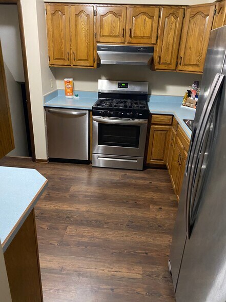 Kitchen with new dishwasher - 1309 Sw Lynn Dr.