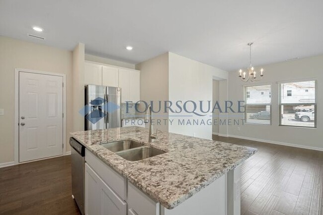 Building Photo - End-Unit Townhome with Loft, Open Floor Plan & Patio, Conveniently Located Near Dining, Shopping,...