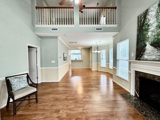 Building Photo - READY NOW!! End-Unit Loft-Style Condo w/1s...