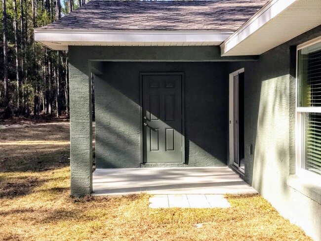 Covered Porch and Storage Closet - 9356 N Peachtree Way