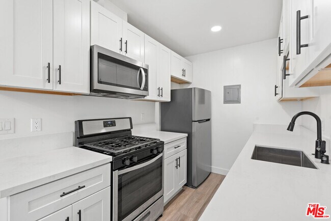 Building Photo - 3707 S Canfield Ave