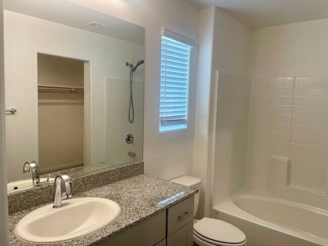 Building Photo - 3 bed 2 bath 2 car garage Townhome "On the Strip" South Las Vegas Blvd
