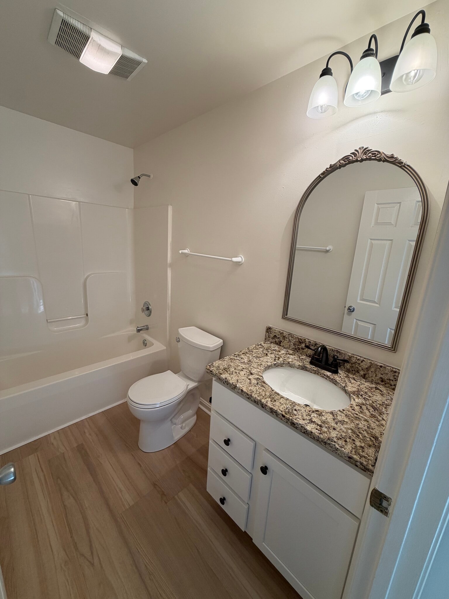 New vanity, mirror, and modern lighting - 903 Harwood Rd