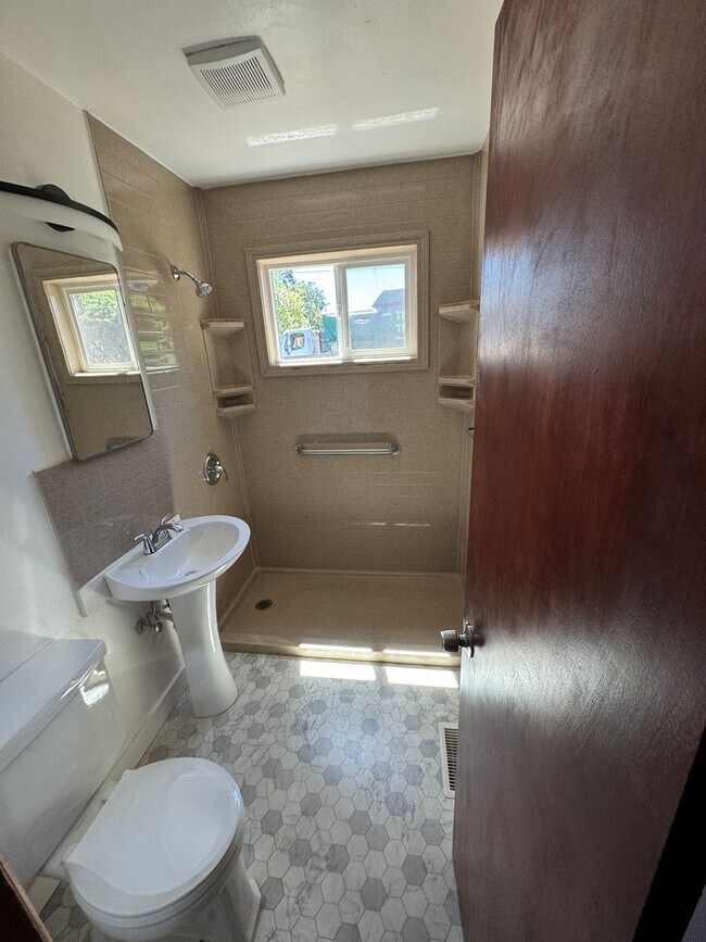 Building Photo - Freshly Updated 3 Bedroom 1 bath Home with Garage, Fenced Yard & Pet Friendly!