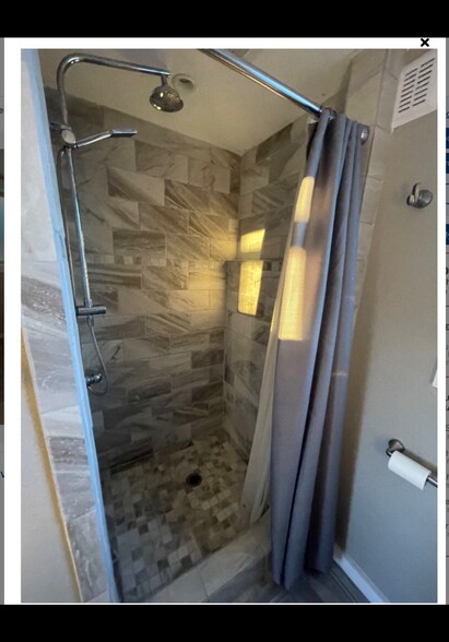 Rain shower - 35227 58th Ave S
