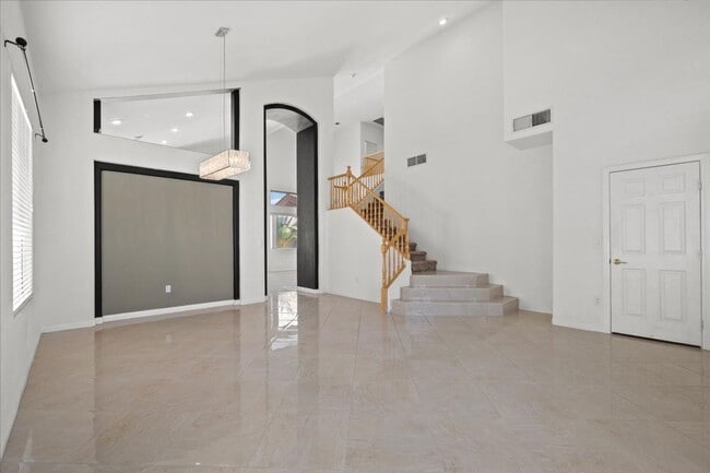 Building Photo - Contemporary Guard-Gated Retreat Near Rhodes Ranch Golf Club with Elegant Open-Concept Living