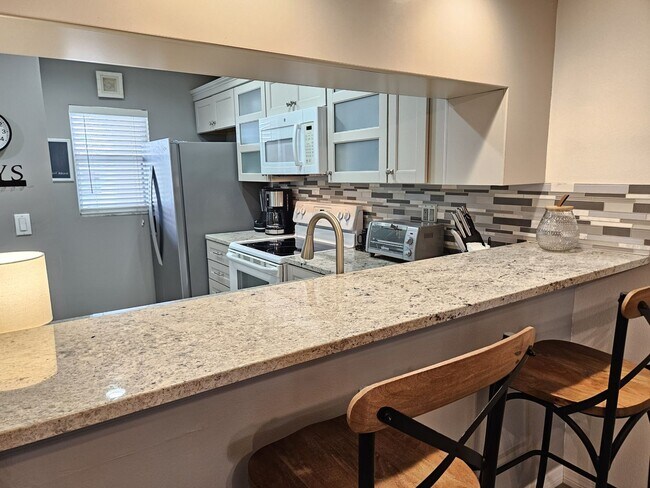 Building Photo - Charming First-Floor Condo in Plantation Golf and Country Club with a Community Pool Access!