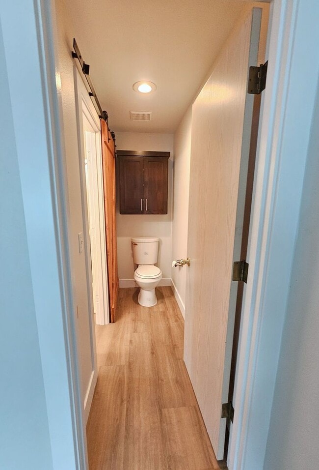 Building Photo - Large Updated 2 Bed, 1.5 Bath Townhouse w/ Washer & Dryer + Off-street Parking