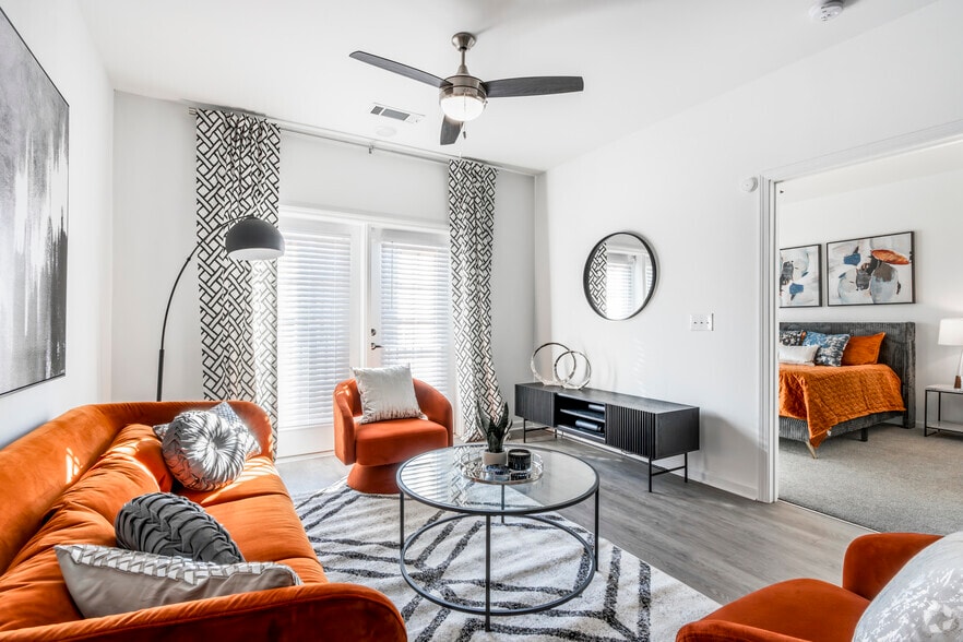 Steele Creek Apartments 1BR, 1BA - Living room and bedroom - The Exchange at Steele Creek