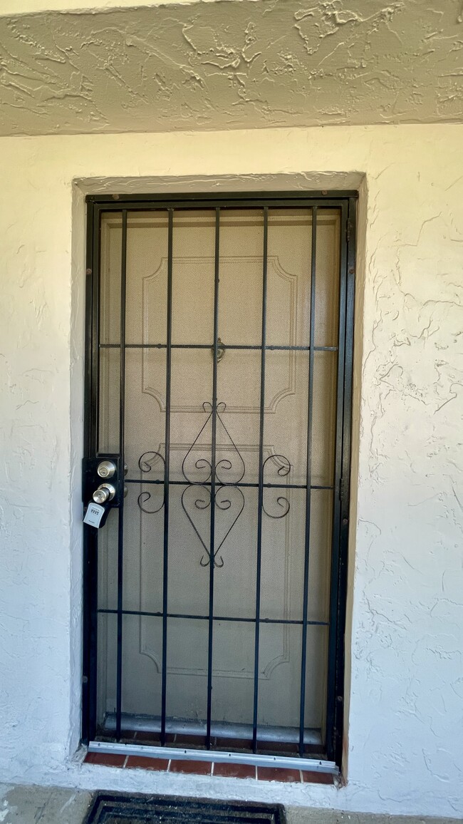 Gated First Floor Door Entrance - 485 N Pine Island Rd