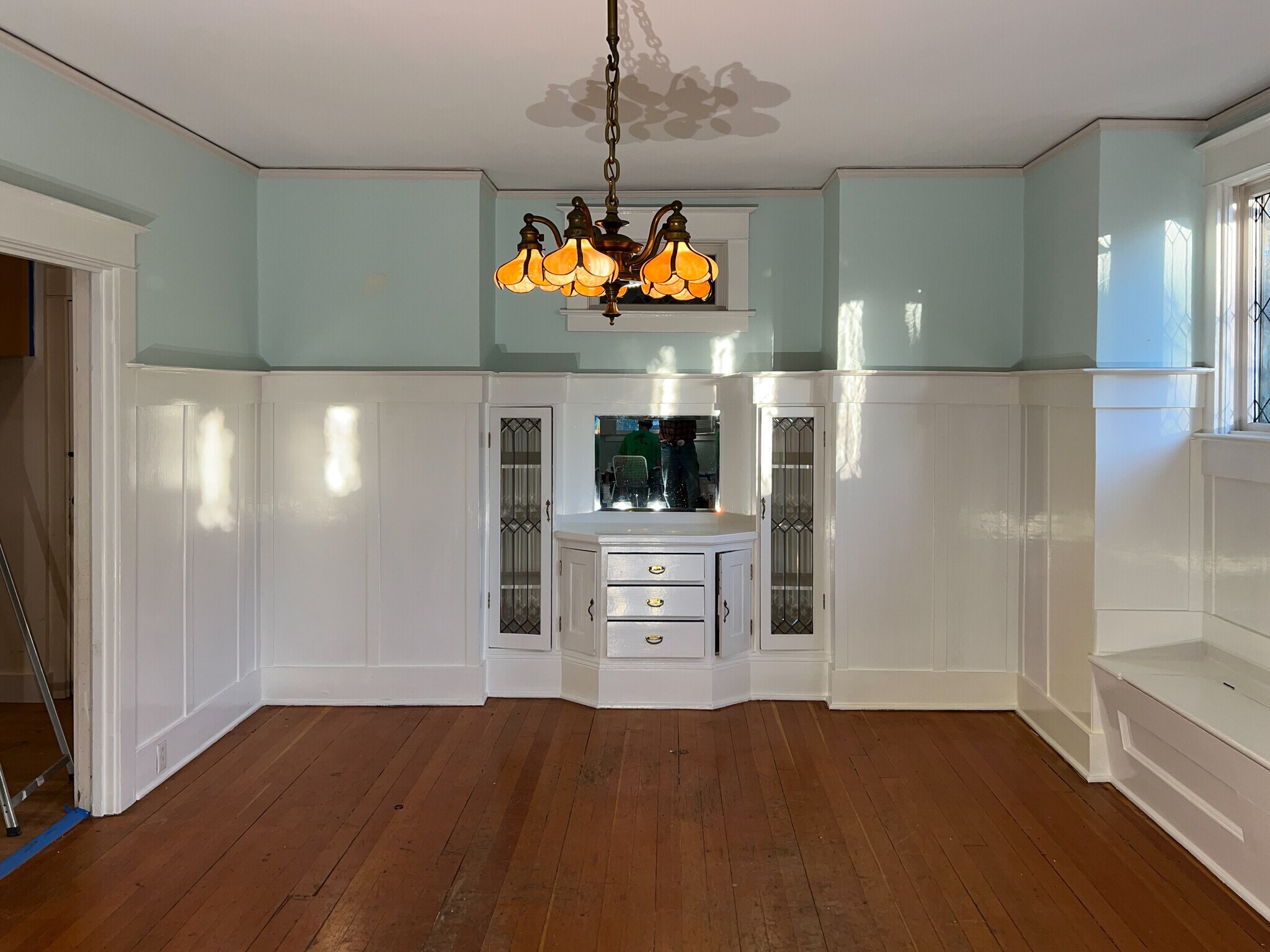 Dining room with vintage chandelier and built-in’s. - 1402 SE 32nd Ave