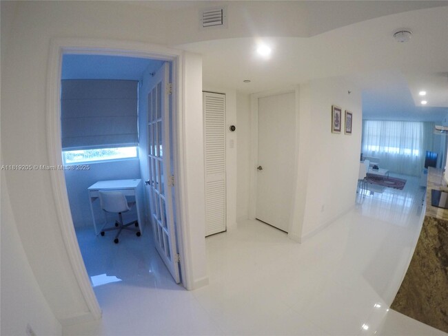 Building Photo - 6917 Collins Ave