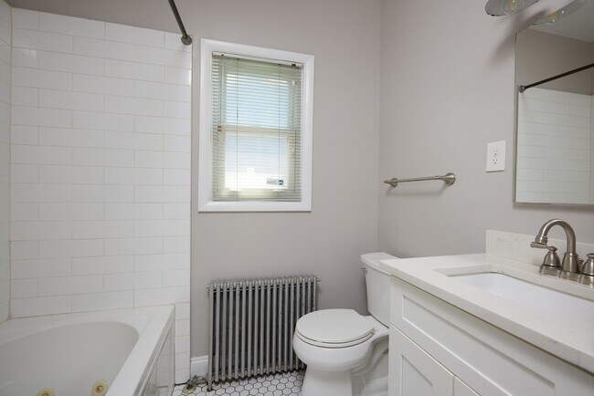 Building Photo - Charming 3BR/2BADetached Bungalow Blocks to the Arboretum is Move-in Ready!