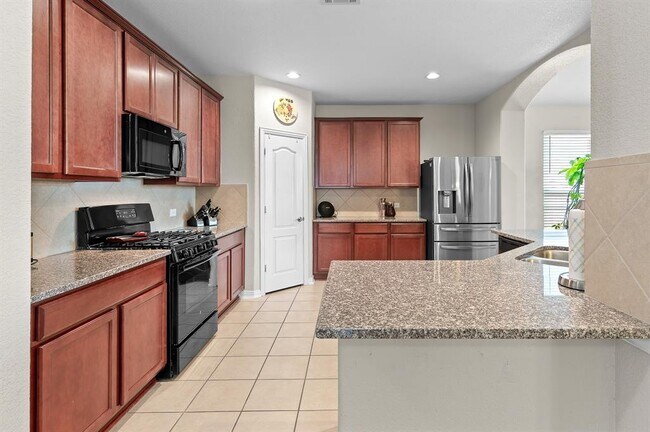 Building Photo - 8017 Bassano Dr