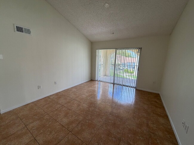 Building Photo - End unit with private side entrance!