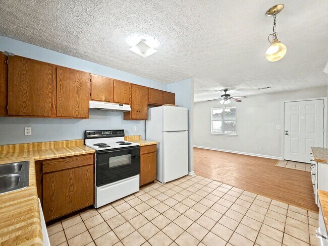 Building Photo - Tibbitts Drive Duplex