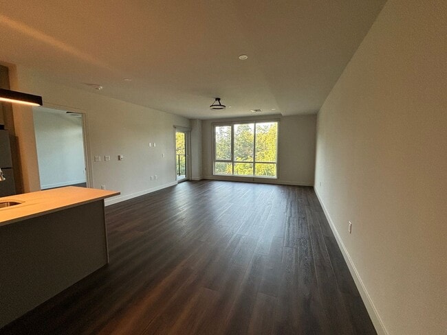 Building Photo - Spacious 1-Bed, 2-Bath + Den with Lake Vie...