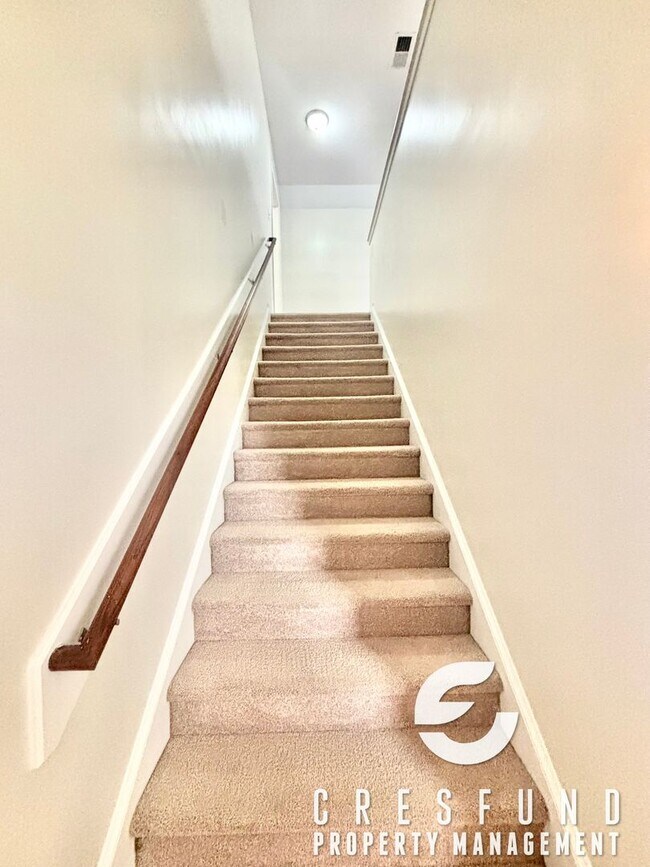Building Photo - Freshly Painted and Spacious 4 Bedroom, 3 ...