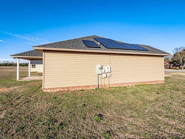Building Photo - Available now! Has solar panels!