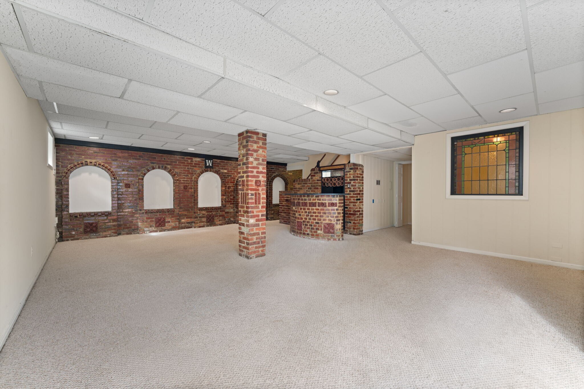 Full bar area in lvl Plenty of room for games and entertaining in Lower Level - 9 Snug Hill Ct