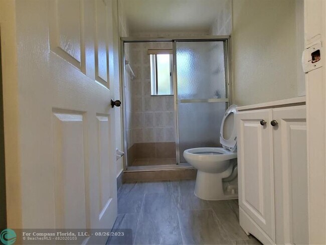 Building Photo - 7661 Tamarac Island Cir