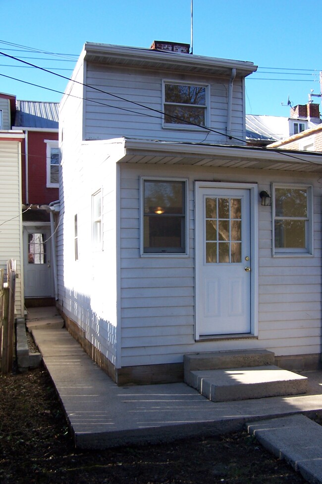 Rear of House , walkway and door to back porch - 141 N Bedford St