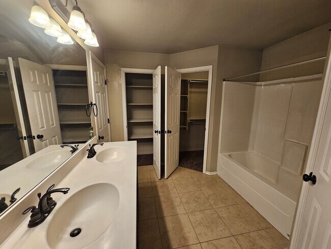 Building Photo - First month Free ! Large corner lot!