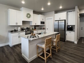 Building Photo - Refined 3-Bedroom Townhome in Sugar City | Spacious Layout, 2-Car Garage & Modern Finishes