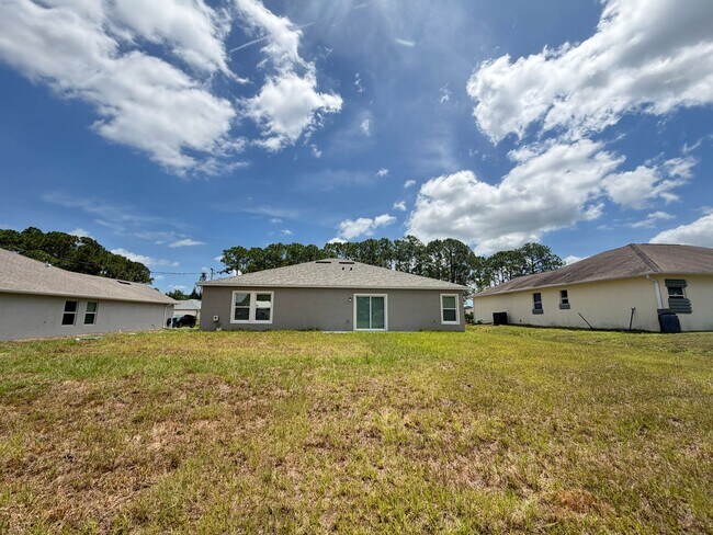 Building Photo - Brand-New 4BR Palm Bay Retreat Designed for Modern Living! NEW BUILD HOME!