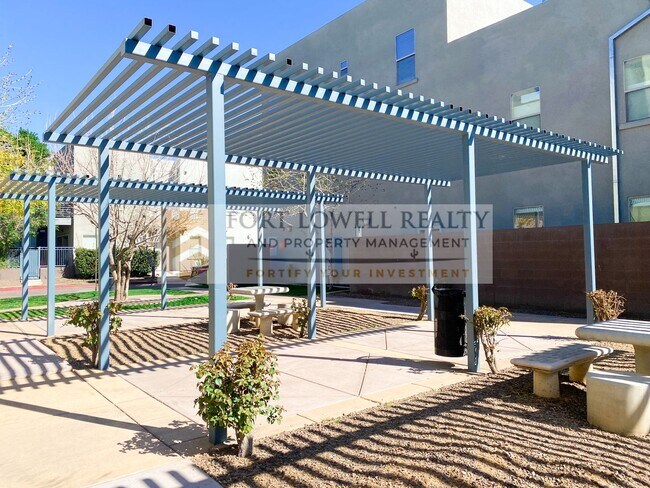 Building Photo - Move in Special OAC.. Modern Desert Living in the Heart of Downtown with PRIVATE GARAGE!!