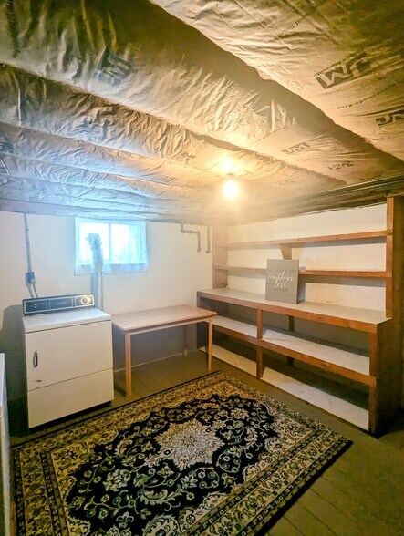 Separate laundry and storage - 65 Hayes St