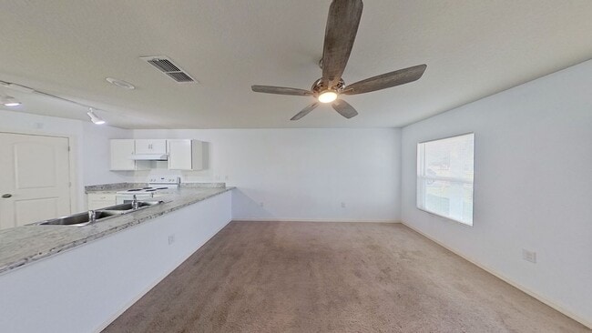 Building Photo - Four Bedroom / Three Bath Home