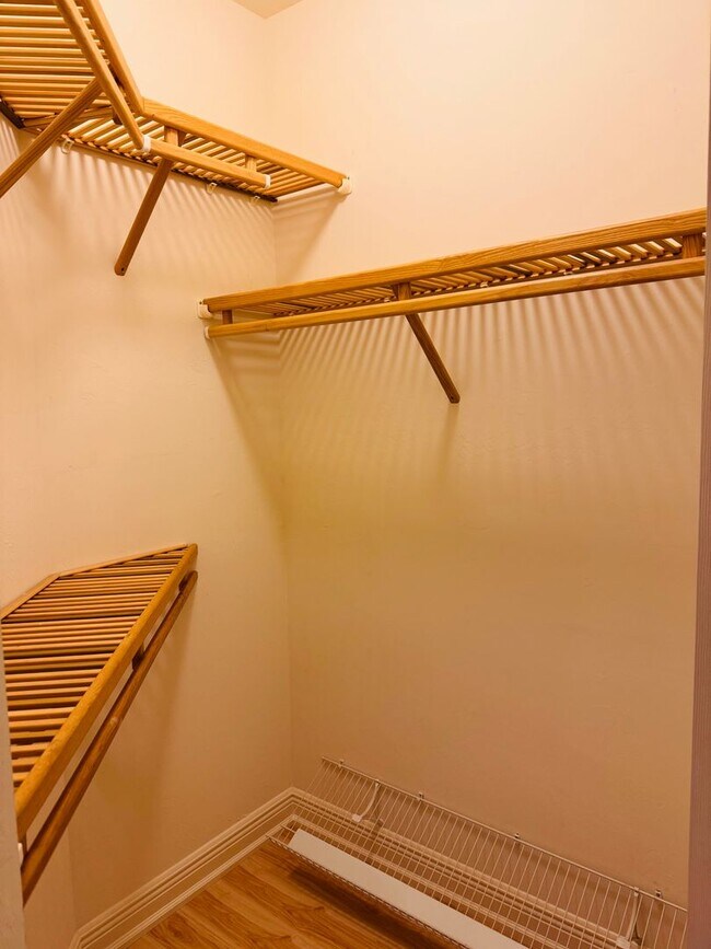 Building Photo - Experience Bell Tower Park. GATED ground floor 2 Bed 2 Bath Den 1 Car Garage Condo.