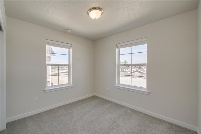 Building Photo - Two Story Townhome Located Off Of Amity & ...