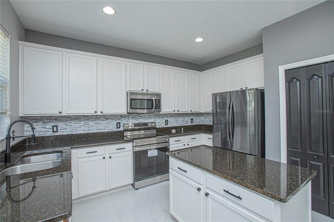 Building Photo - 13141 Moss Park Ridge Dr