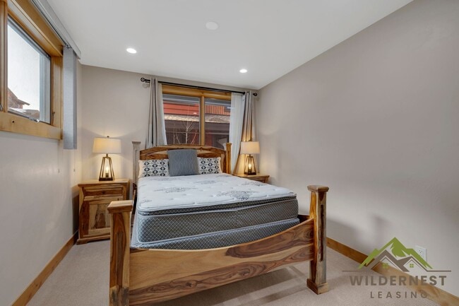 Building Photo - Beautiful Furnished Townhome with infared sauna, finished garage and community amenties