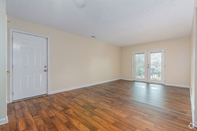 2BR, 1BA - 900SF - Living Room - Auburndale Apartments