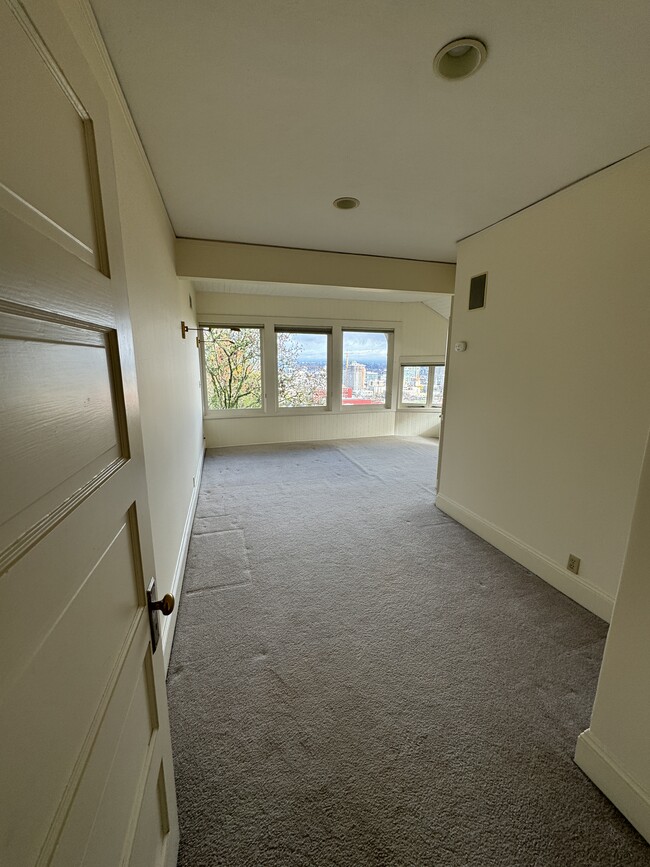 Primary bedroom from hall - 1687 SW Montgomery Dr.